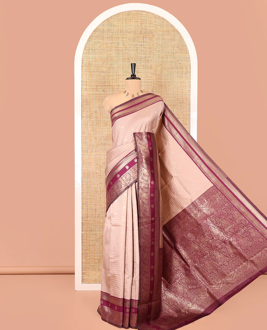 Beige Litchi Saree Features Buttas and Checks, Contrast Traditional Peacock Border, Intricate Pallu, and a Contrast Blouse