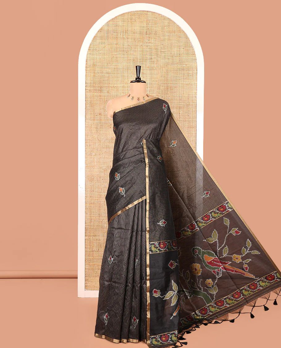 Black Art Tussar Saree, Bedecked with Dotted-Kantha-Style Stripes and Ikkat Buttas on Its Body, a Subtle Piping Border, Pallu of Ikkat Floral and Macaw Parrot Designs, and Paired with a Matching Blouse
