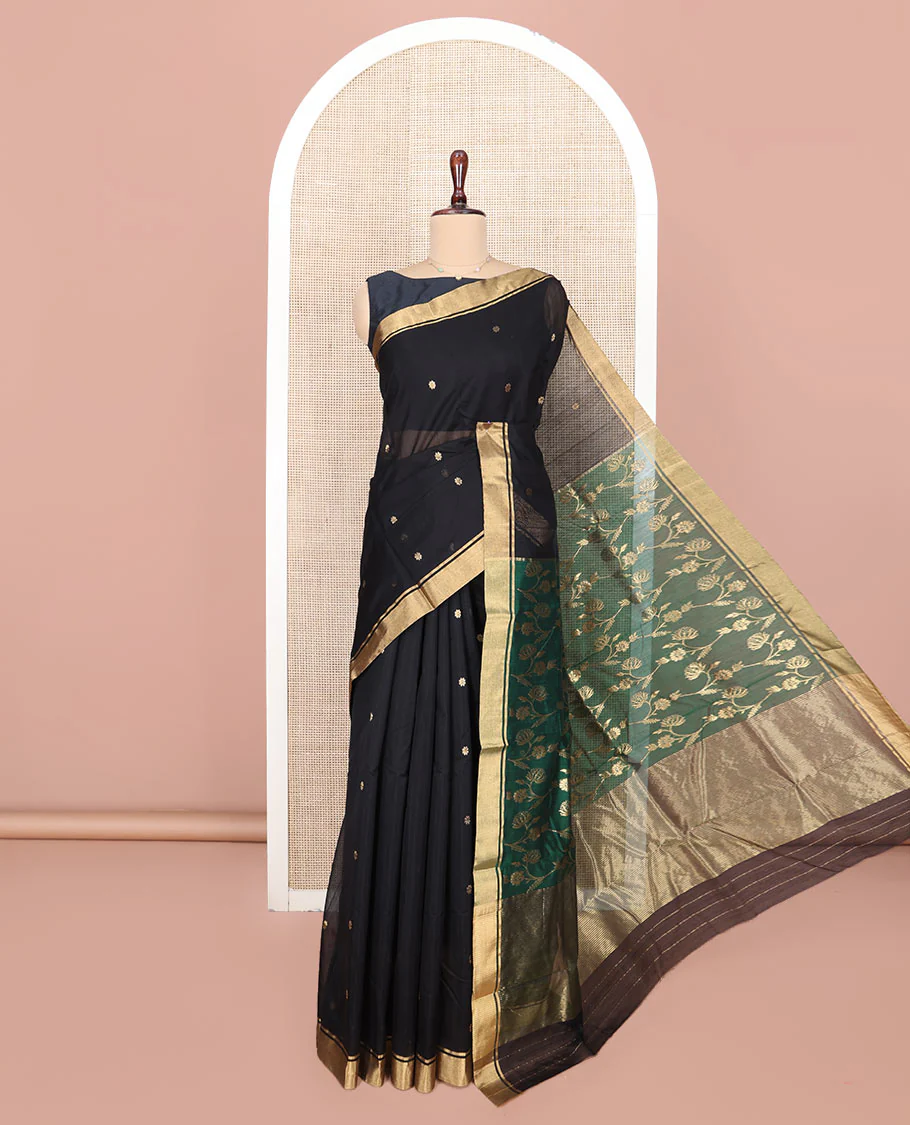 Black Chanderi Cotton Saree, Ornamented with Floral Buttas All Over Its Body, Highlighted by Zari Border, Complemented by Contrast Pallu of Floral Jaal Designs, and Paired with a Contrast Blouse