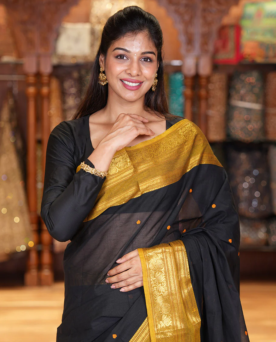 Black Chettinad Cotton Saree, Adorned with Buttas All Over Its Body, Complemented by a Contrast Traditional Zari Rettai Pettu Border, Pallu of Stripes and Buttas, and Paired with a Matching Blouse - Image 2