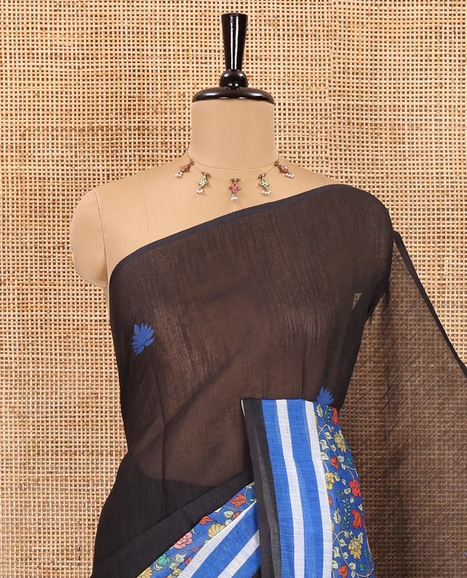 Black floral motifs printed linen cotton saree with contrast kalamkari floral vine printed border, floral vine printed pallu, and a plain blouse - Image 2
