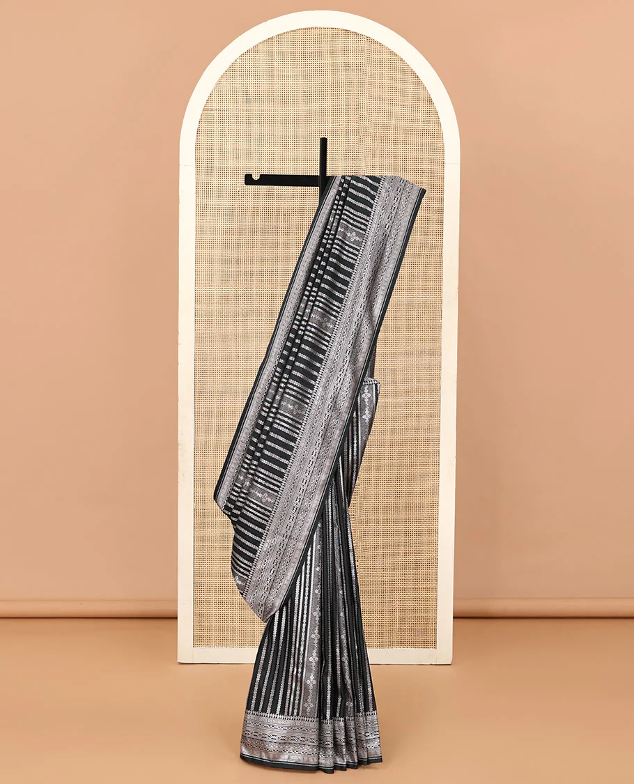 Black geometric jacquard satin silk saree, zari border and pallu steeped with traditional zari designs