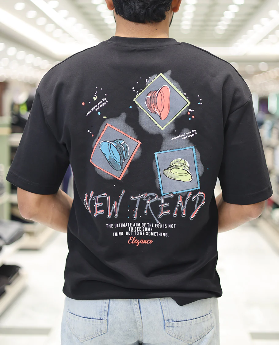 Black Glow in the Dark Cotton-Blended T-Shirt, Decked Up with Colorful Cartoon Motifs Print, Comes with a Crew Neck, Half-Sleeves, Oversized Fit, and Long Length - Image 2