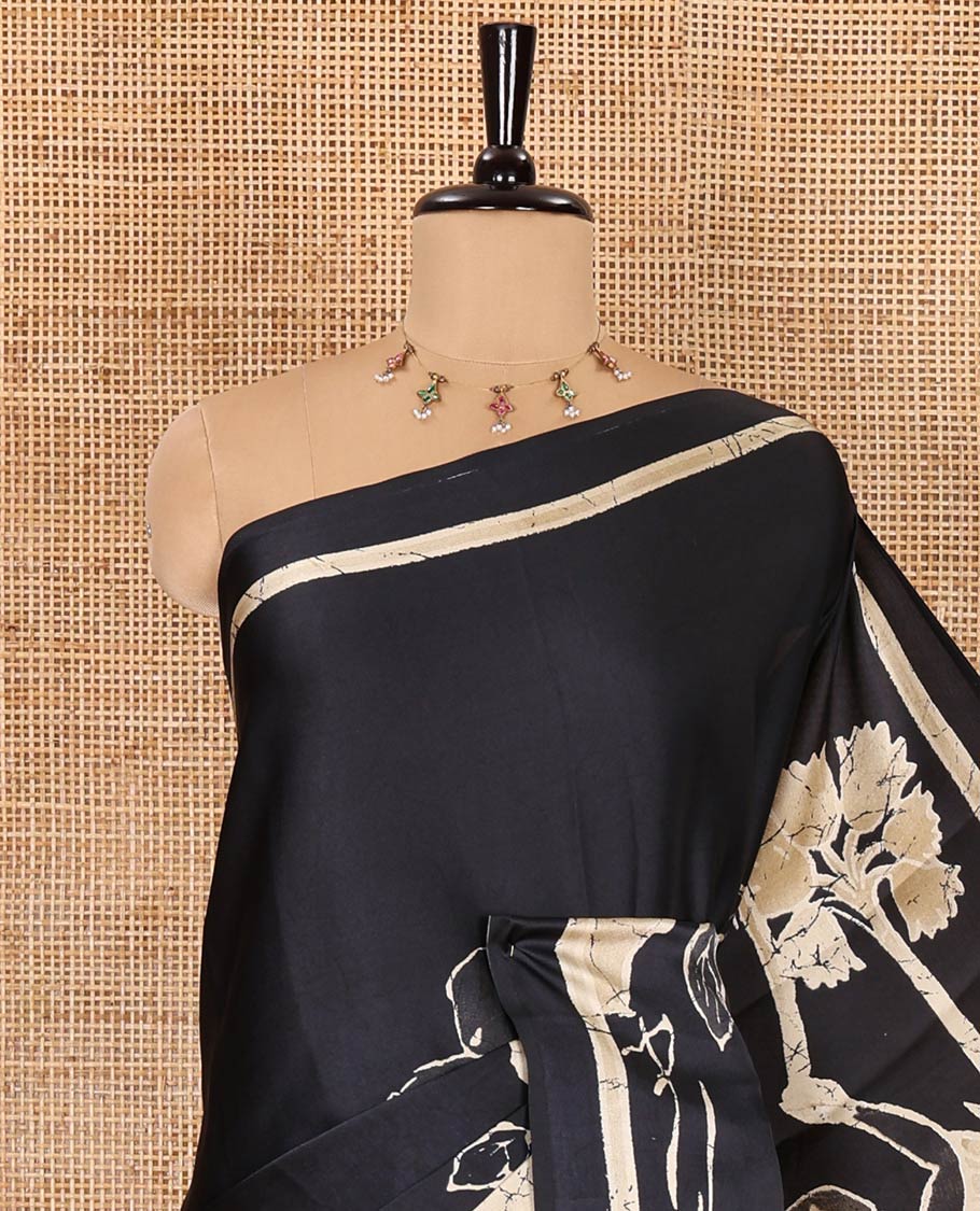 Black jungle-theme tree, animal, and human motifs batik printed satin crepe saree, printed border, printed pallu, and a matching blouse - Image 2