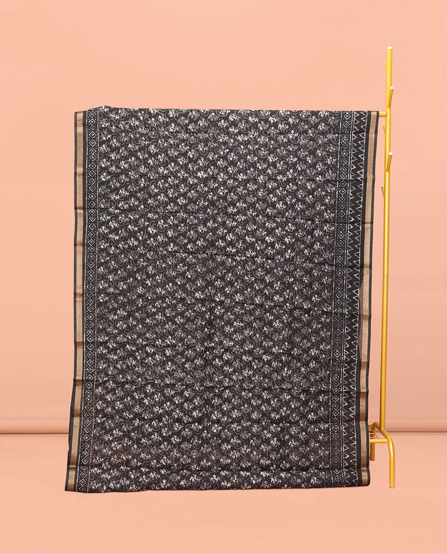 Black Kanchi Cotton Saree, Decked Up with Floral Print All Over Its Body, a Subtle Self-Border, Pallu of Block Printed Geometric Designs, and Paired with a Contrast Blouse