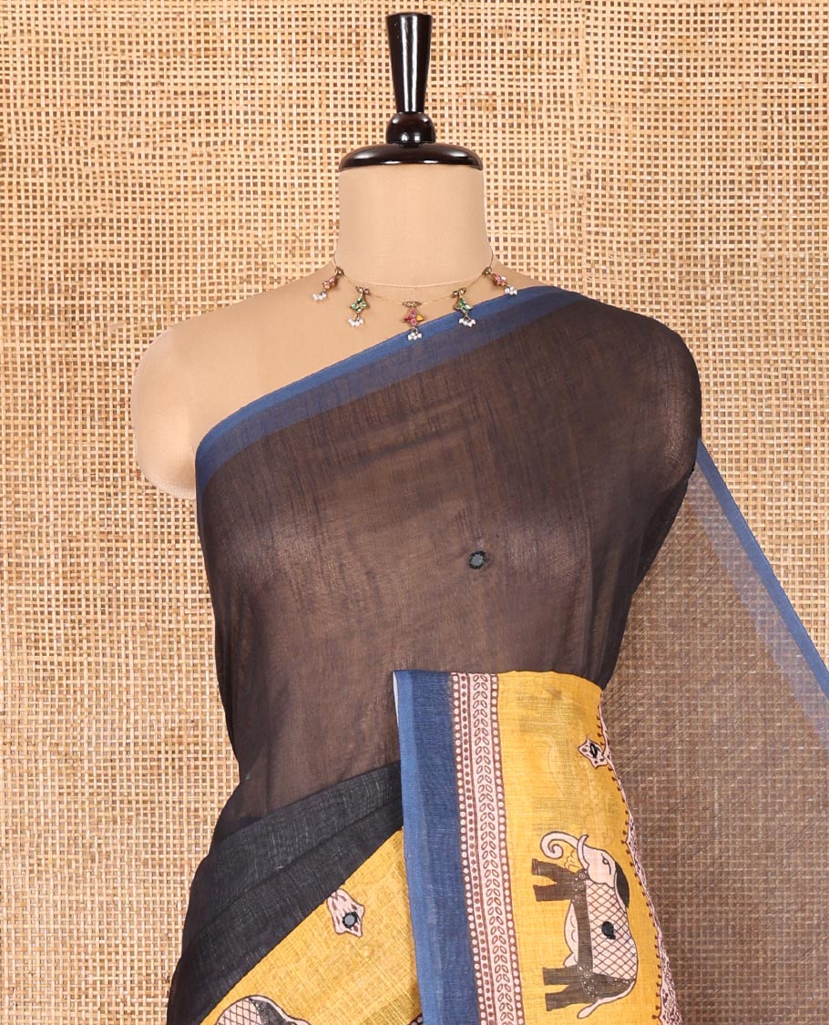 Black Linen Cotton Saree, Gleamed up with Mirror Work On Its Body, Complemented by Contrast Elephant Motifs Printed Border, Pallu Steeped with Elephant Motifs Print, and Paired with a Contrast Blouse - Image 2