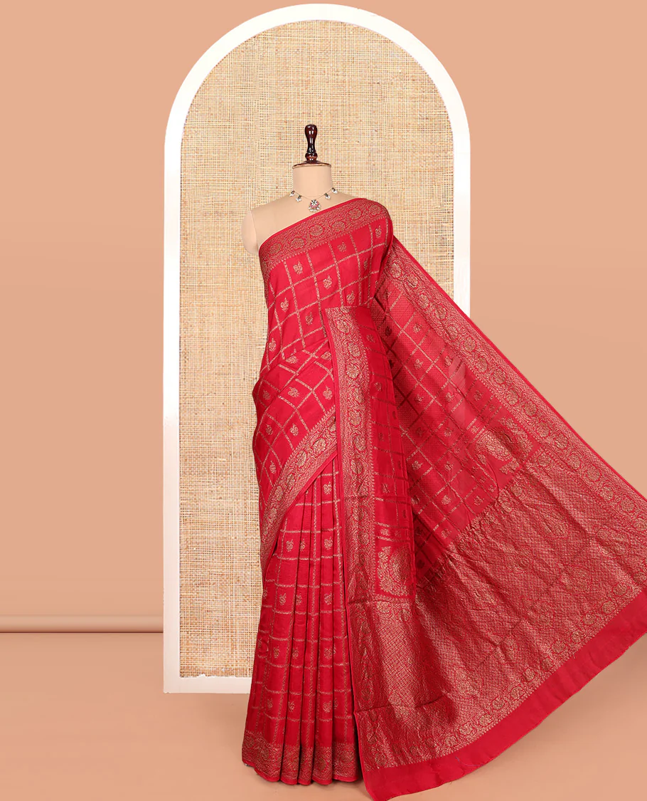 Red Matka Silk Saree, Prettified with Peacock Butta Enclosed Checks on Its Body, Highlighted by a Floral Creeper Design Border, Grand Pallu of Jaal Designs, and Paired with a Matching Blouse