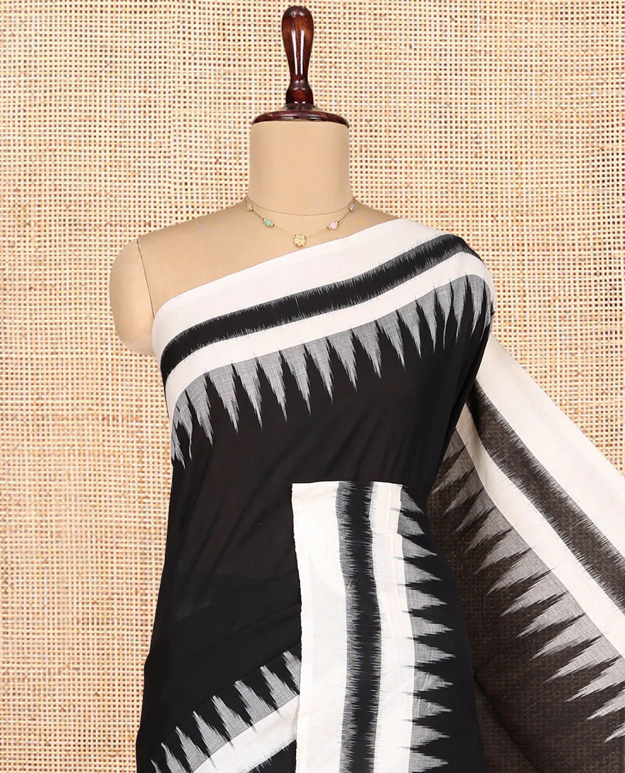 Black Plain Ikkat Cotton Saree, Complemented by a Contrast Ikkat Temple Border, Pallu Steeped with Buttas, and Paired with a Contrast Blouse - Image 2