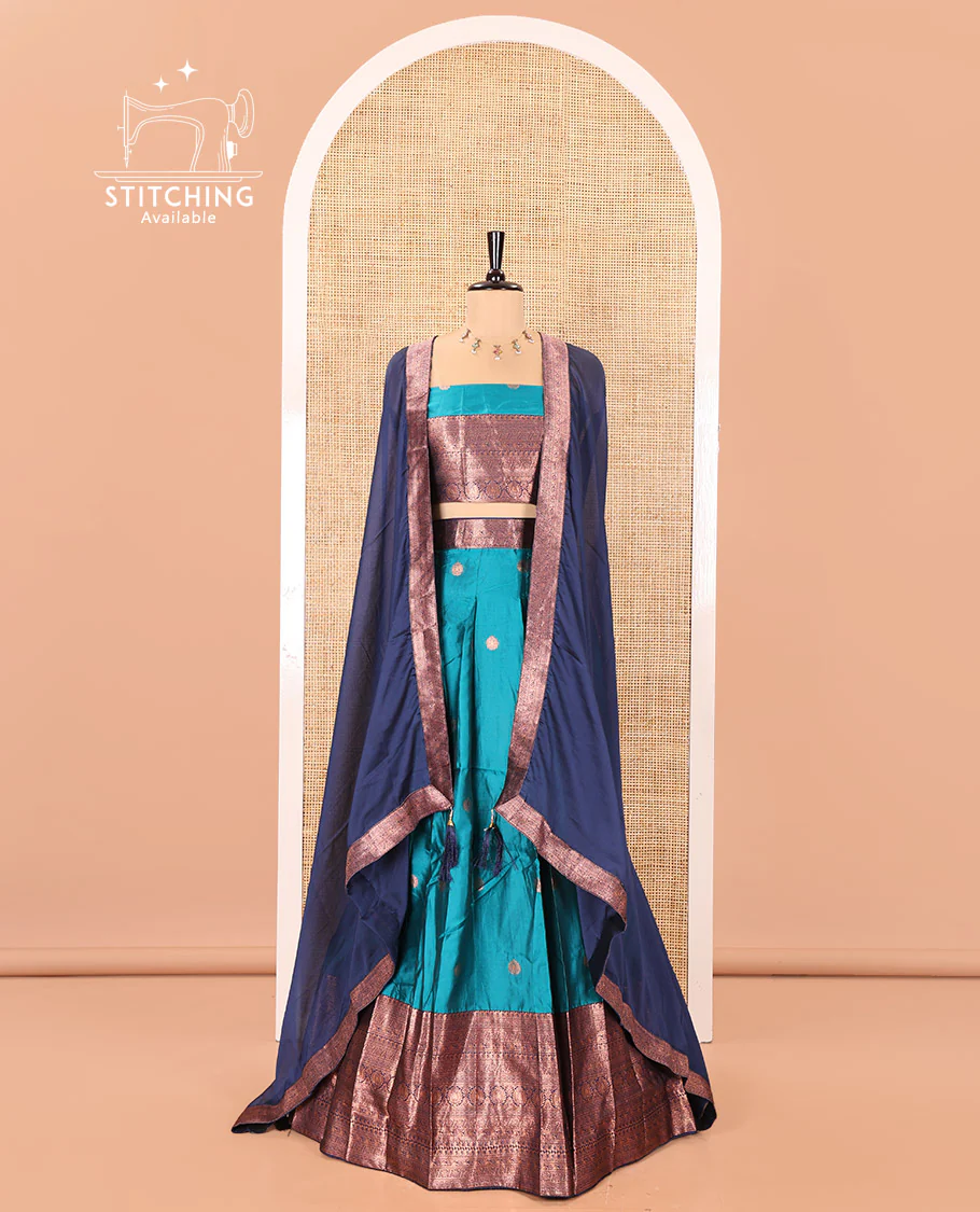 Blue and Navy Blue Semi-Banarasi Half-Saree, Adorned with Zari Buttas on Its Skirt, Complemented by a Contrast Traditional Zari-Design Border, Paired with a Matching Blouse, and a Contrast Satin Georgette Zari-Bordered Dhavani - Image 2