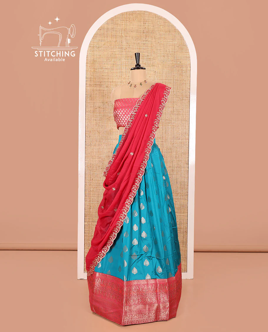 Blue and Rani Pink Semi-Banaras Silk Half-Saree Featuring Zari Buttas All Over the Skirt, Highlighted with a Contrast Traditional Zari Design Border, Rudraksham Motifs Woven Blouse, and a Shimmer Georgette Scallop-Embroidered Dhavani - Image 3