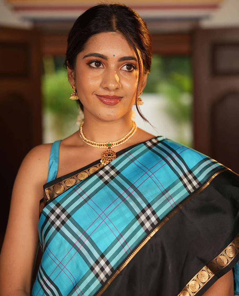 Blue-Black Vasundhara Lite Silkmix Saree Features Checks, Contrast Rettai Pettu Rekku-Poun Border, Zari-Striped Pallu, and a Contrast Blouse - Image 2