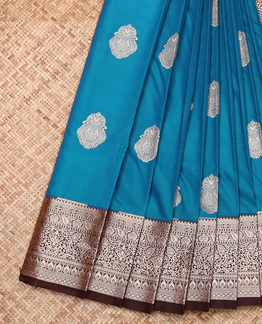 Blue Budget Silk Saree, Woven with Zari Buttas, Complemented by a Contrast Traditional Zari Border, Intricately Designed Pallu, and a Contrast Blouse