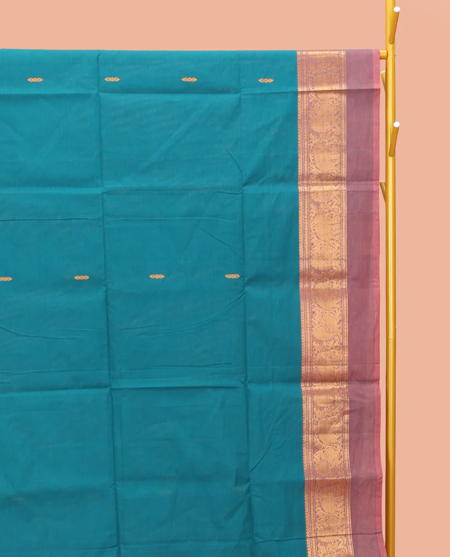 Blue Chettinad Cotton Saree, Bedecked with Thread Buttas All Over Its Body, Complemented by a Contrast Ganga-Jamuna Kal Eragina Border of Kodi Peacock and Elephant Designs, Pallu of Buttas and Stripes, and Paired with a Matching Blouse - Image 2