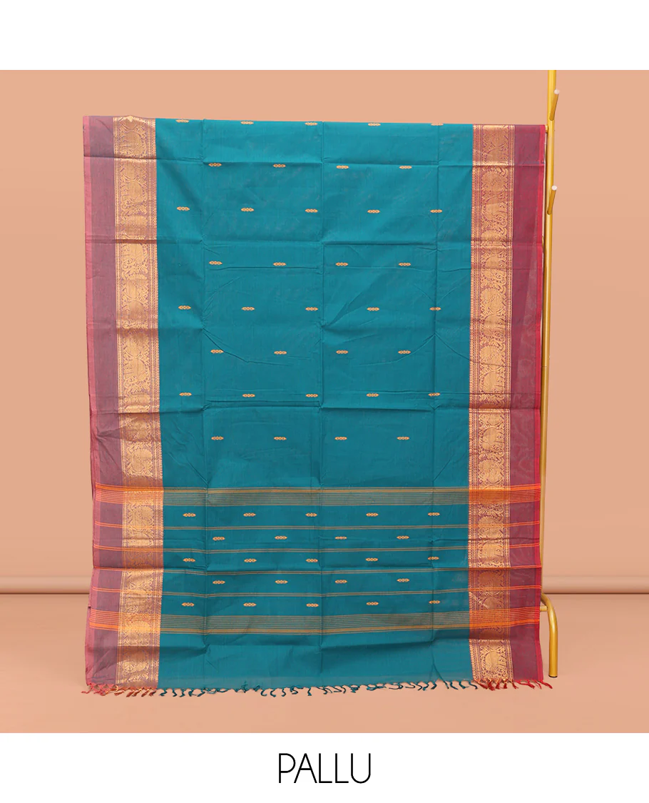 Blue Chettinad Cotton Saree, Bedecked with Thread Buttas All Over Its Body, Complemented by a Contrast Ganga-Jamuna Kal Eragina Border of Kodi Peacock and Elephant Designs, Pallu of Buttas and Stripes, and Paired with a Matching Blouse - Image 3