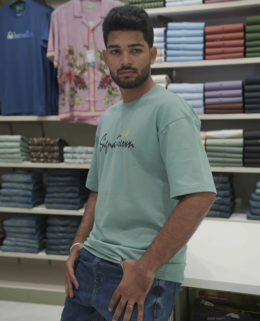 Blue Cotton-Blended Oversized T-Shirt, Elevated with Multi-Color Funky Motifs Front and Back Print, Comes with a Crew-Neck, Half-Sleeves, and Long Length - Image 3