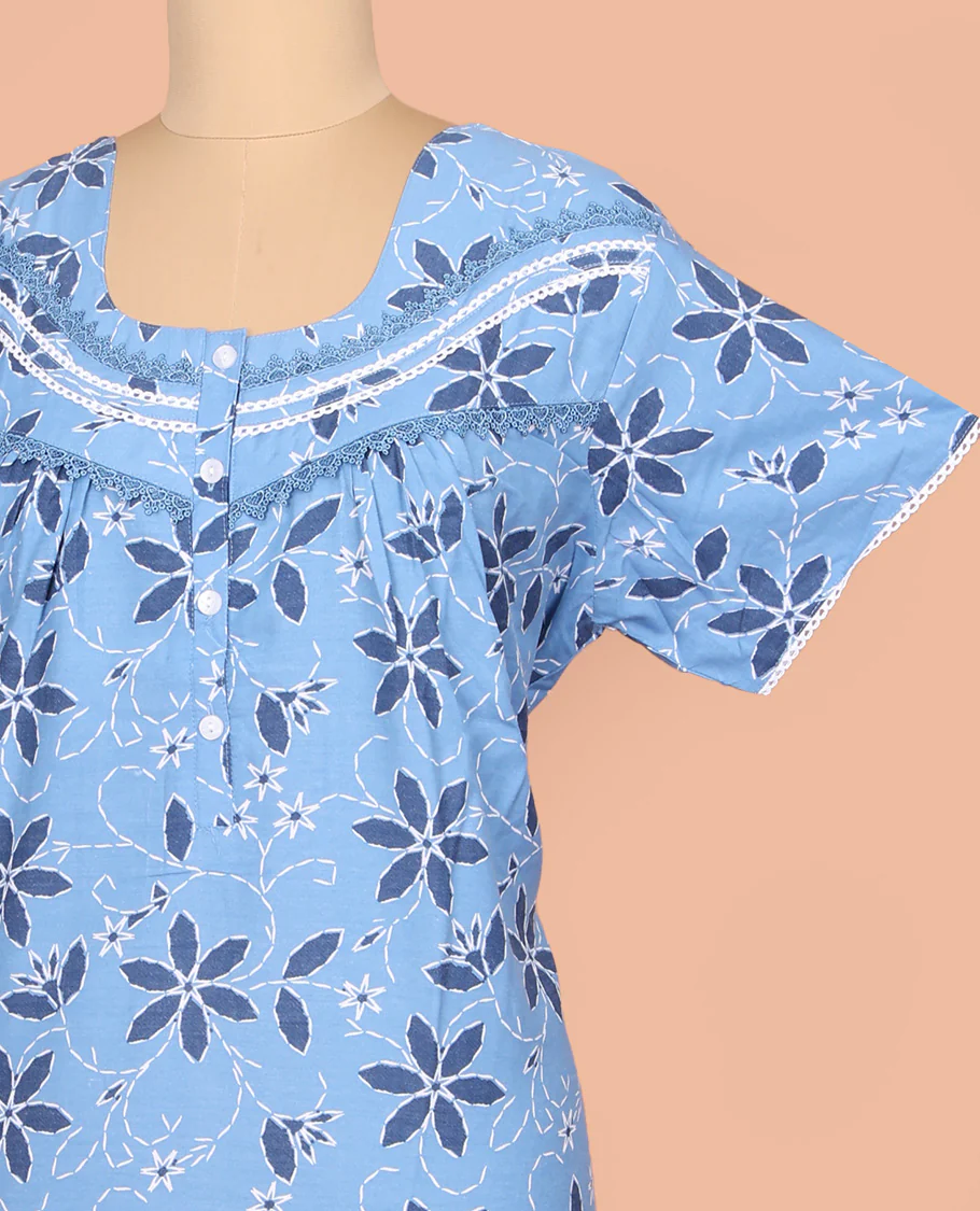 Blue Cotton Nighty Adorned with Floral Print, Featuring Lace Work, Round Front Neck, and Half Sleeves