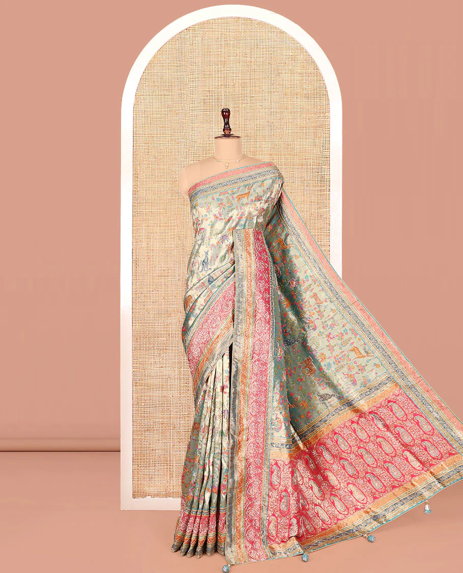 Blue Dola Silk Saree, Gracefully Embellished with Floral and Fauna Design on Its Body, Highlighted by Traditional Motif Stone Work Border, Pallu of Paisley Design, and Paired with a Contrast Blouse