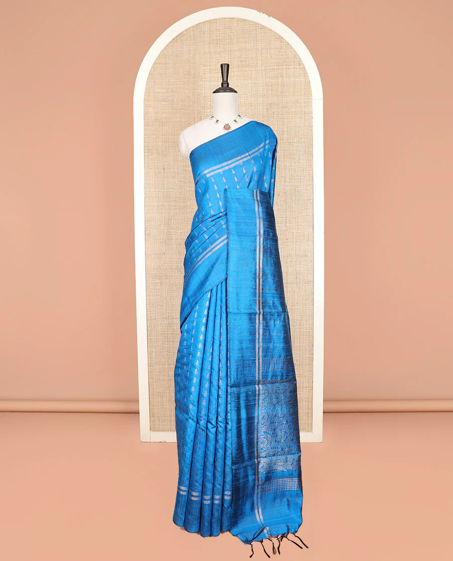 Blue Dupion Silk Saree Subtly Sparkled with Dobby-Style Buttas All Over Its Body, Subtly Woven Border, Pallu Decked Up with Floral Jaal Designs, and Paired with a Matching Blouse - Image 3
