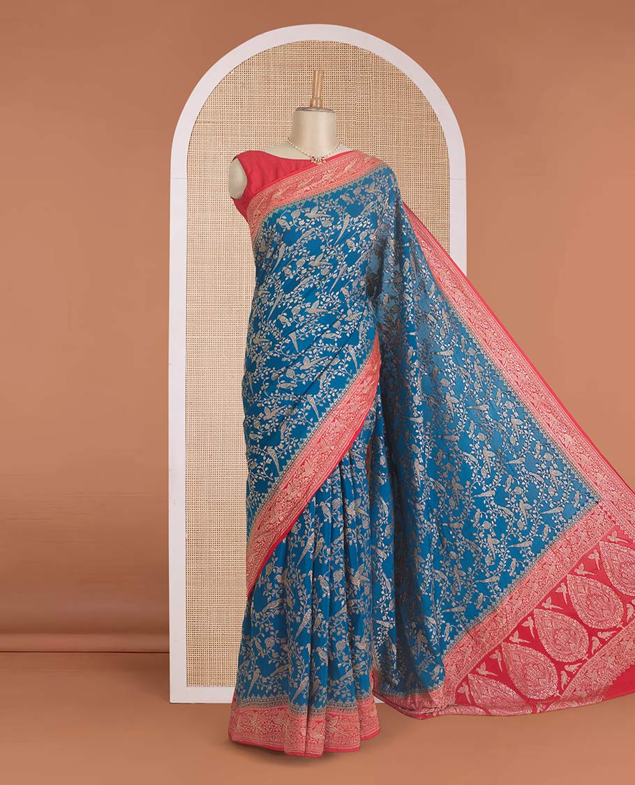 Blue floral and bird jaal jacquard banaras crepe saree, contrast floral and bird jaal zari border, and pallu of Mughal style motifs - Image 2