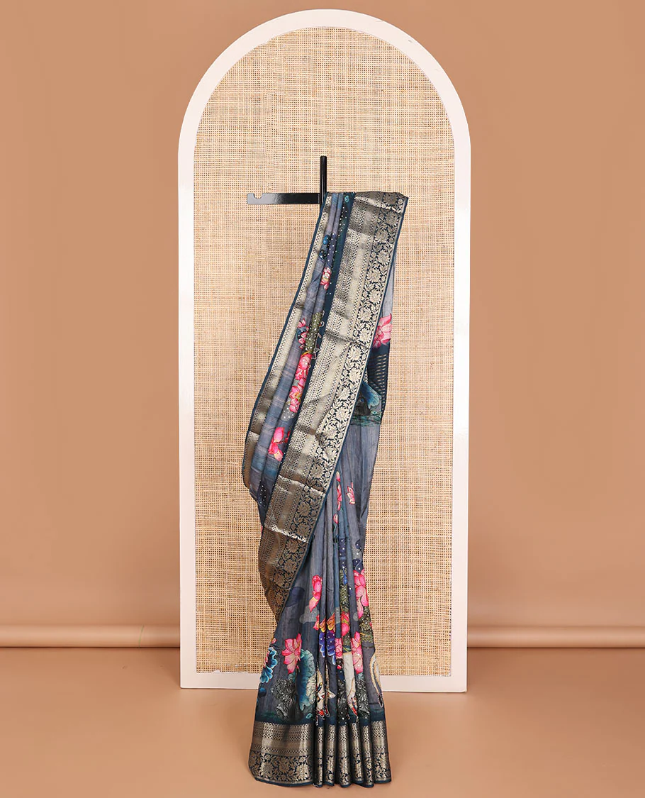 Blue floral & pichwai cow printed with embroidered dola silk saree, contrast traditional zari design border & zari striped pallu