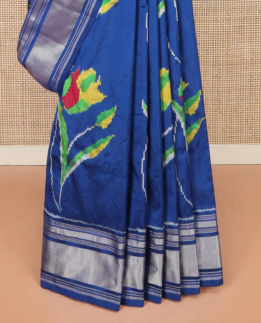 Blue Ikkat Silk Saree Colourfully Woven in Floral Buttas Across the Body, Featuring a Zari Border, a Pallu Adorned with Ikkat Weave, and Paired with a Matching Blouse - Image 4
