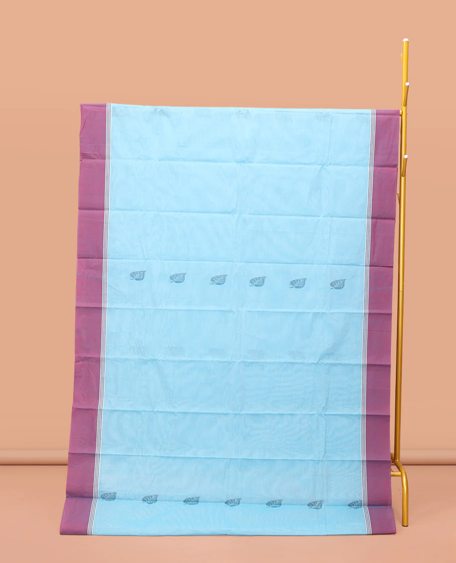 Blue Kanchi Cotton Saree, Adorned with Leaf Buttas On Its Body, Complemented by a Contrast Border, Intricate Patterned Pallu, and a Matching Blouse