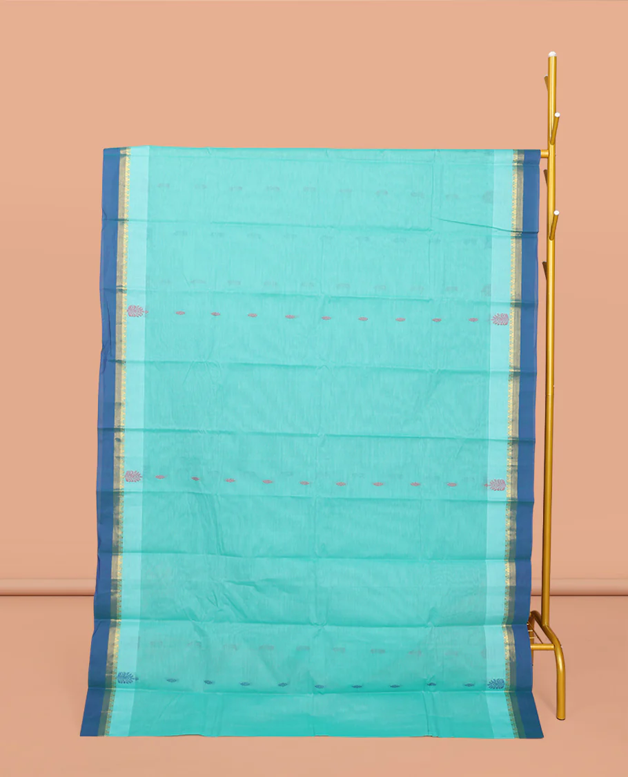 Blue Kanchi Cotton Saree, Decorated with Buttas All Over Its Body, Complemented by a Contrast Border, Pallu of Paisley Design, and Paired with a Matching Blouse