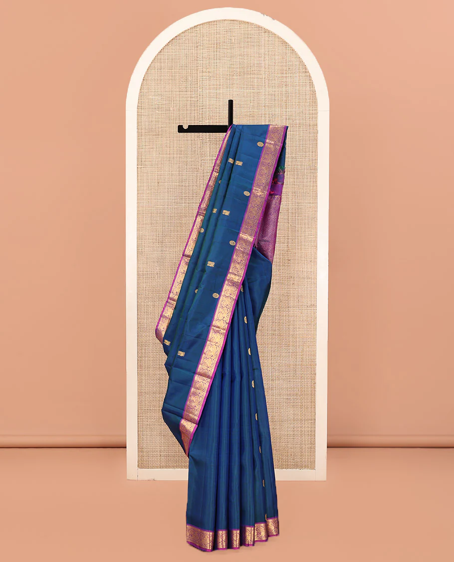 Blue Kanchipuram Silk Saree, Artfully Woven with Mayil Chakram Buttas All Over Its Body, Complemented by a Contrast Border of Muthu, Kathir, and Mayil Designs, Grand Jaal Pallu, and Paired with a Contrast Blouse
