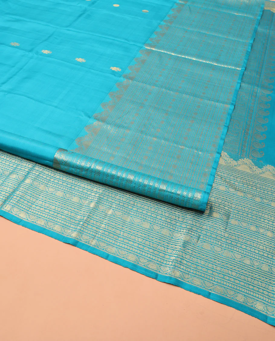 Blue Kanchipuram Silk Saree, Decorated with Iruthalai Pakshi Buttas All Over Its Body, Highlighted by a Zari Border of Puli Nagam, Manga, Kamalam, and Kodi Visiry Designs, Pallu of Human Figurines, and Paired with a Matching Blouse - Image 2