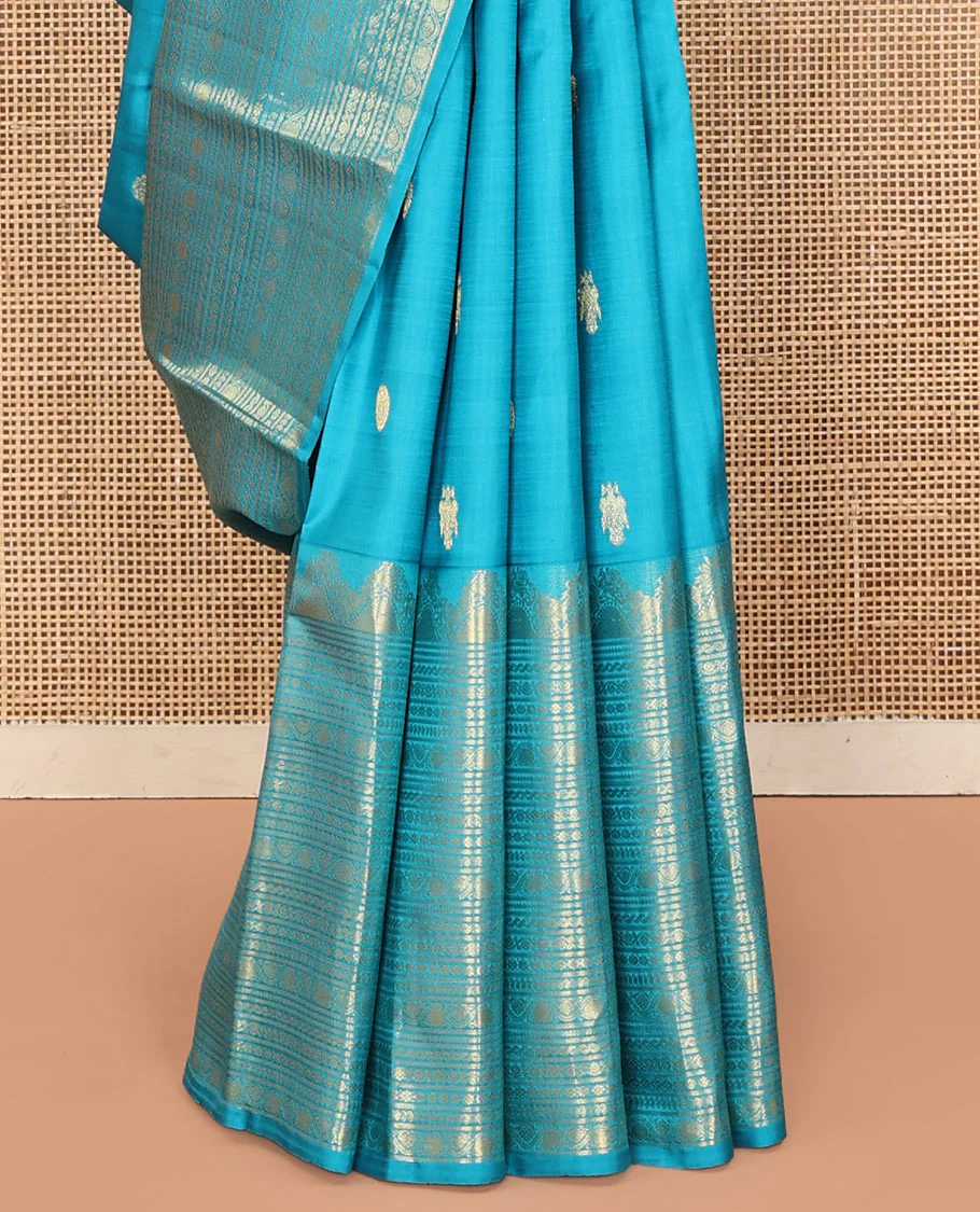 Blue Kanchipuram Silk Saree, Decorated with Iruthalai Pakshi Buttas All Over Its Body, Highlighted by a Zari Border of Puli Nagam, Manga, Kamalam, and Kodi Visiry Designs, Pallu of Human Figurines, and Paired with a Matching Blouse - Image 4