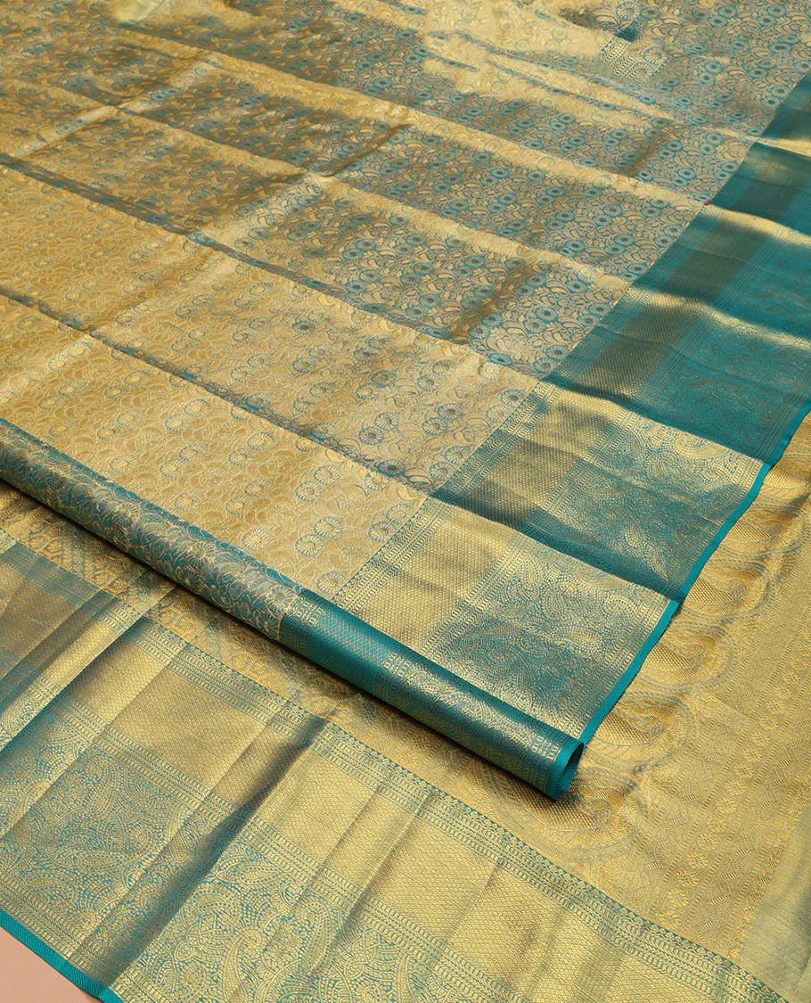 Blue Kanchipuram Silk Saree, Elegantly Highlighted with Zari Jacquard Design All Over Its Body, Highlighted by a Zari Border of Thilakam Mokku, Muthu, Mayil Kann, and Manga Designs, and Pallu of Mughal-Style Designs, and Paired with a Matching Blouse - Image 2