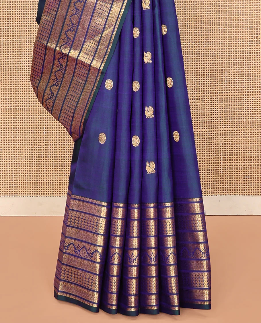 Blue Kanchipuram Silk Saree, Embellished with Mayil and Chakram Buttas All Over Its Body, Highlighted by a Zari Border of Traditional Designs, Pallu Steeped with Traditional Designs, and Paried with a Matching Blouse - Image 4