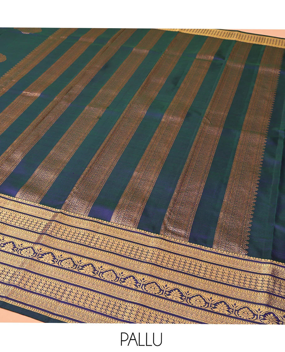 Blue Kanchipuram Silk Saree, Embellished with Mayil and Chakram Buttas All Over Its Body, Highlighted by a Zari Border of Traditional Designs, Pallu Steeped with Traditional Designs, and Paried with a Matching Blouse - Image 5