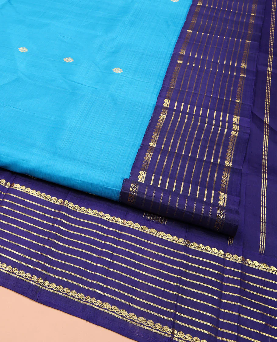 Blue Kanchipuram Silk Saree, Embellished with Zari Buttas, Complemented by Contrast One-Sided Korvai Border of Thilakam Mokku and Banaras Designs, Pallu Steeped with Floral Designs, and Comes Without a Blouse - Image 2