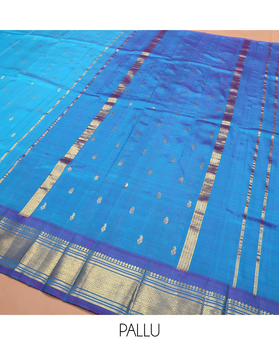 Blue Kanchipuram Silk Saree Enthralled with Zari Buttas All Over Its Body, Complemented by a Contrast One-Sided Border of Paneer Sombu, Banaras, Muthu, and Jaal Designs, Zari Design Pallu, and Comes Without a Blouse - Image 5