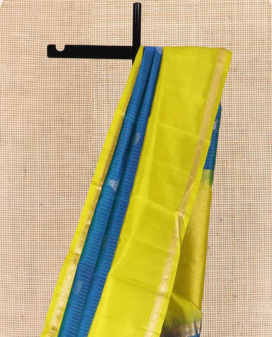 Blue Kanchipuram Silk Saree, Sparsely Sparkled with Muthu Stripes and Jhumka Buttas All Over Its Body, Complemented by a Contrast Rettai Pettu Border of Thilakam Mokku, and Laddu Kamalam Designs, Subtly Sparkled Pallu, and Paired with a Contrast Blouse - Image 3