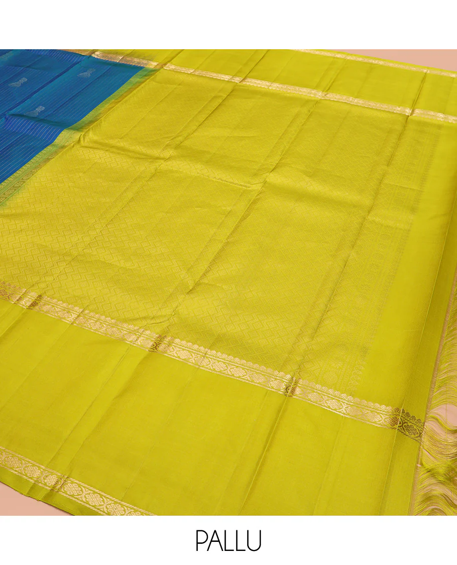 Blue Kanchipuram Silk Saree, Sparsely Sparkled with Muthu Stripes and Jhumka Buttas All Over Its Body, Complemented by a Contrast Rettai Pettu Border of Thilakam Mokku, and Laddu Kamalam Designs, Subtly Sparkled Pallu, and Paired with a Contrast Blouse - Image 5