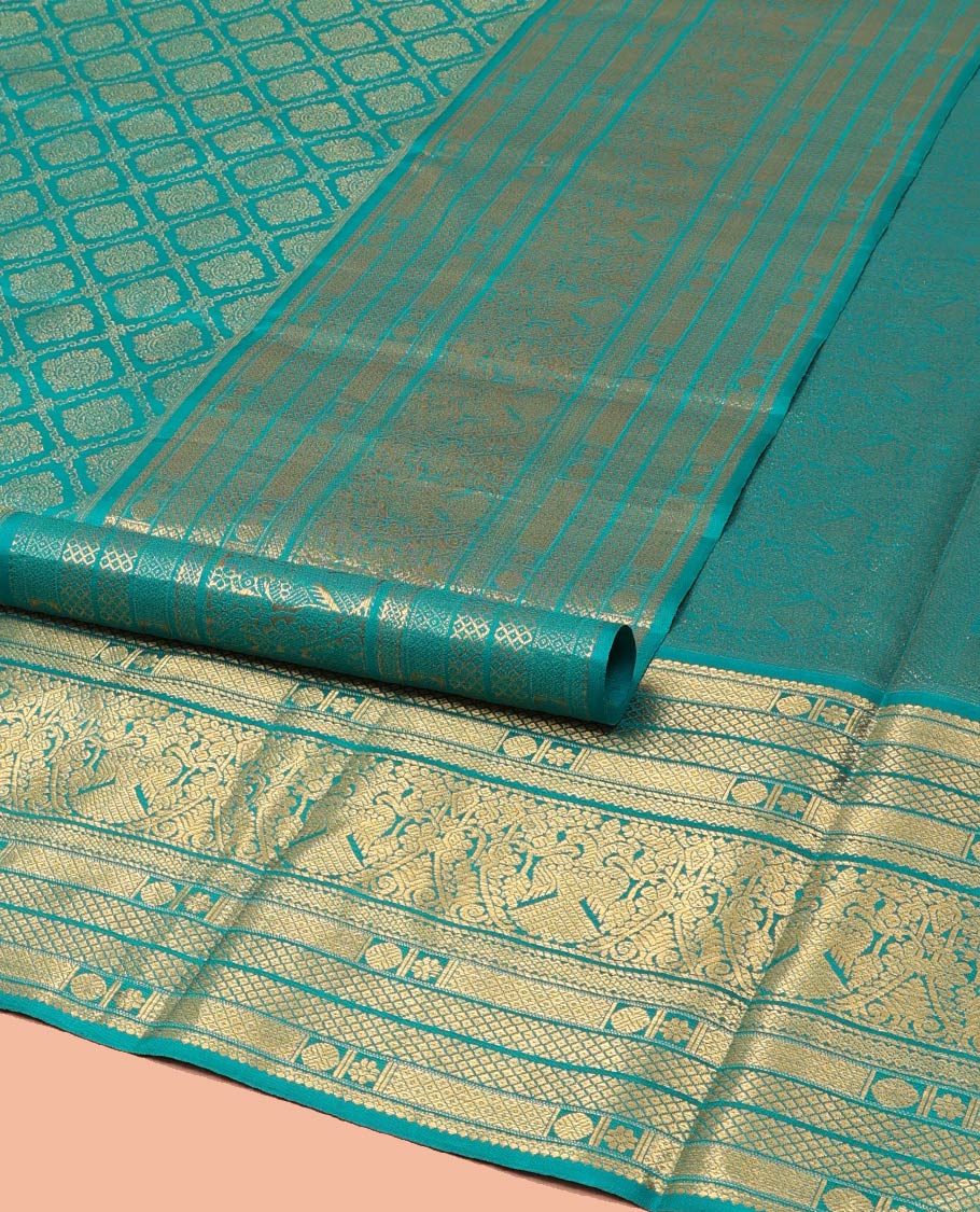 Blue Kanchipuram Wedding Silk Saree, Finely Crafted with Jacquard Design on Its Body, Highlighted by Zari Border of Mayil Kann, Rudraksham, Kamalam, and Iruthalai Pakshi Designs, Intricately Designed Pallu, and Paired with a Matching Blouse - Image 2