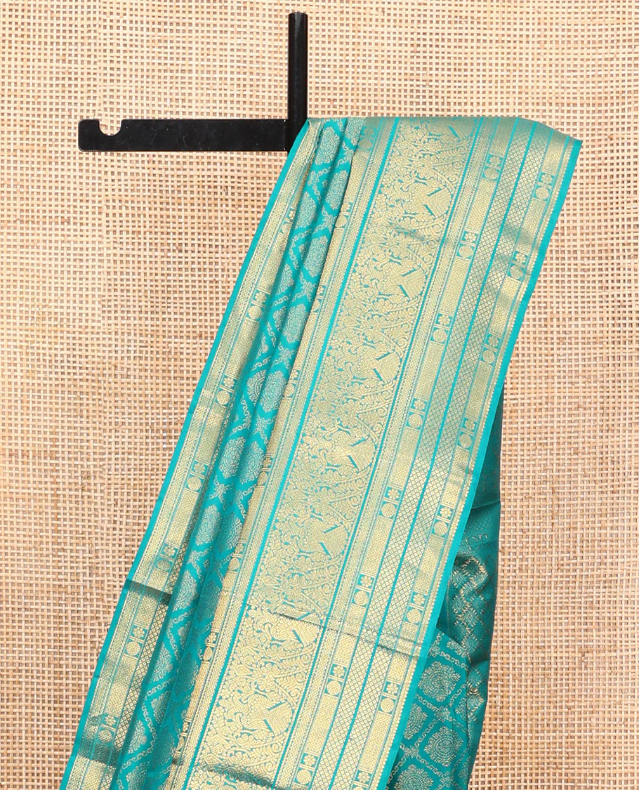 Blue Kanchipuram Wedding Silk Saree, Finely Crafted with Jacquard Design on Its Body, Highlighted by Zari Border of Mayil Kann, Rudraksham, Kamalam, and Iruthalai Pakshi Designs, Intricately Designed Pallu, and Paired with a Matching Blouse - Image 3