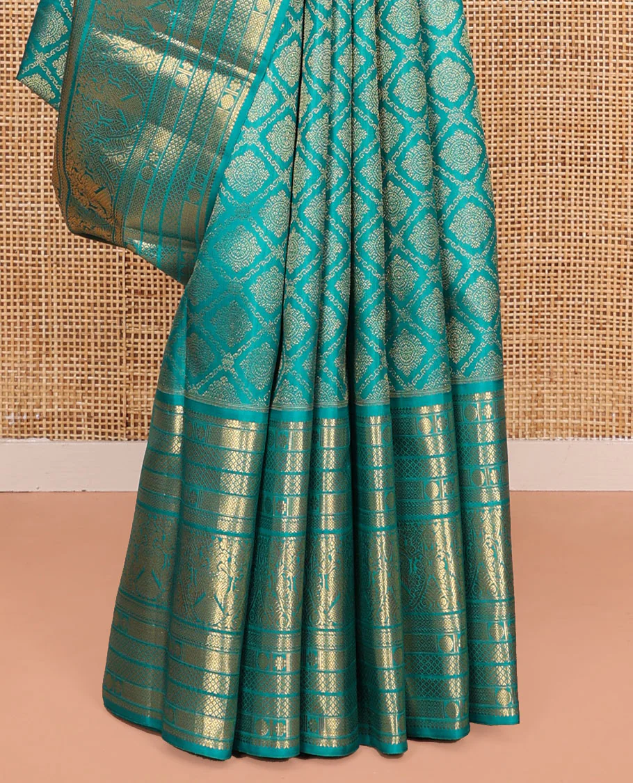 Blue Kanchipuram Wedding Silk Saree, Finely Crafted with Jacquard Design on Its Body, Highlighted by Zari Border of Mayil Kann, Rudraksham, Kamalam, and Iruthalai Pakshi Designs, Intricately Designed Pallu, and Paired with a Matching Blouse - Image 4