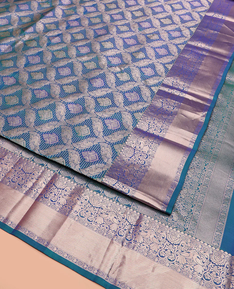 Blue Kanchipuram Wedding Silk Saree Graced with Ogee Jacquard Design, Complemented by Zari Border Featuring Thilakam Mokku, Kamalam, Manga, and Mayil Designs, Opulently Detailed Pallu of Annam Charkam Enclosed Checks, and Paired with a Matching Blouse - Image 3