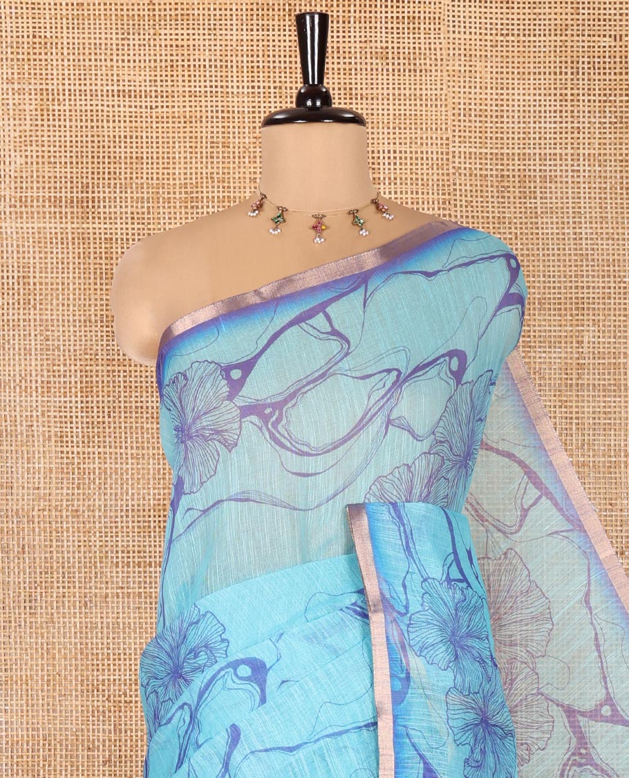 Blue Linen Cotton Saree, Adorned with Abstract Floral Print On Its Body, Subtle Piping Border, Pallu of Floral and Geometric Print, and Paired with a Contrast Blouse - Image 2