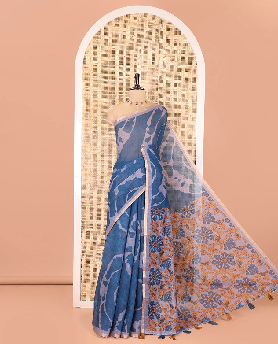 Grey Linen Cotton Saree, Adorned with Shibori Prints on Its Body, Subtle Contrast Piping Border, Pallu of Floral Print, and Paired with a Matching Blouse