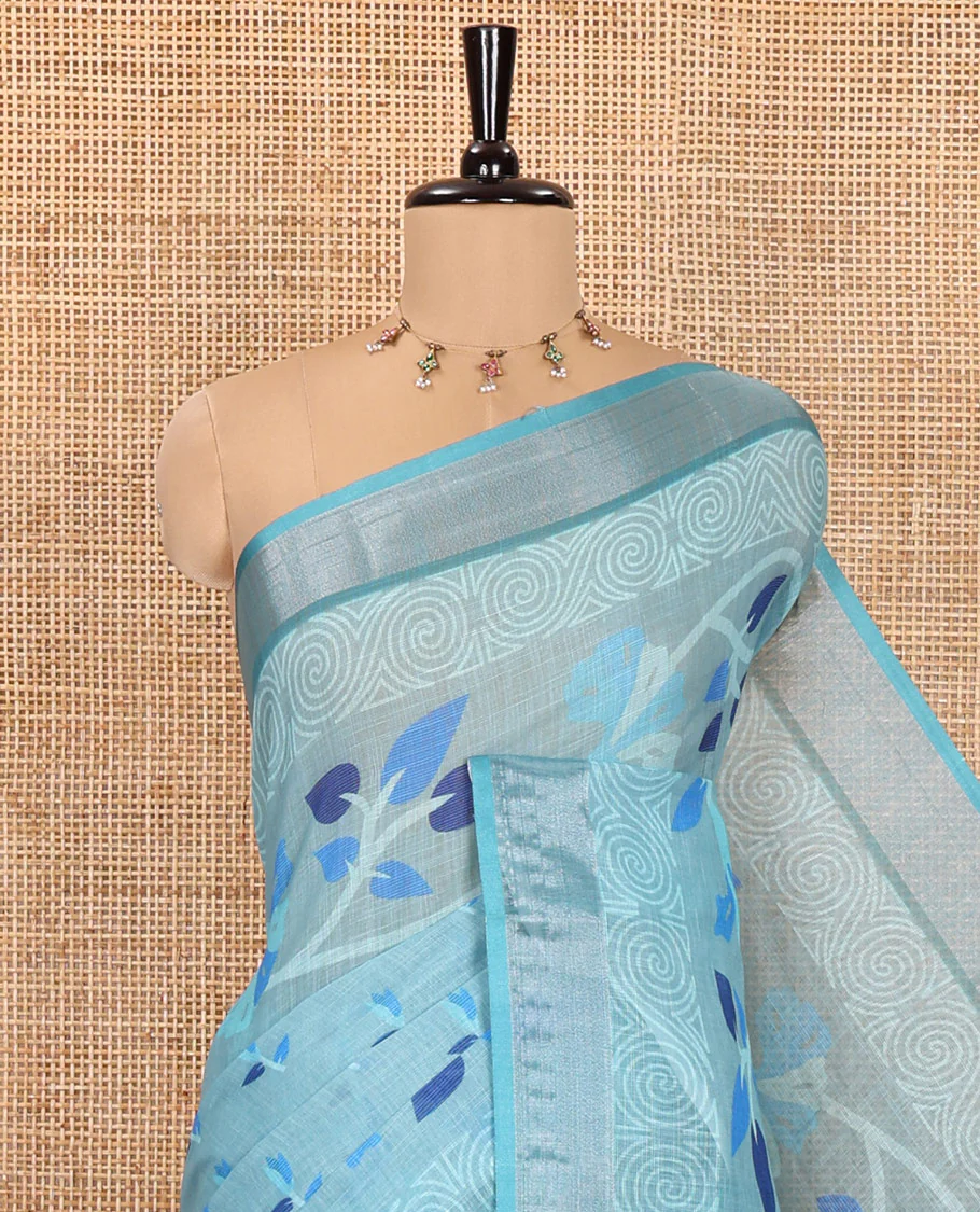 Blue Linen Cotton Saree, Prettified with Leaf Vine Printed on Its Body, Contrast Bavanji Border, Printed Pallu, and Paired with a Contrast Blouse - Image 2