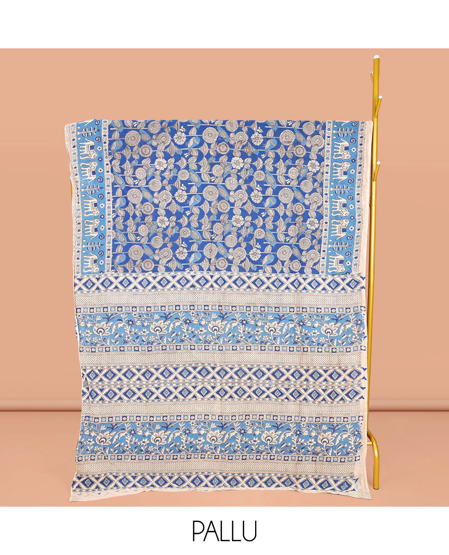 Blue Machine-Printed Kalamkari Cotton Saree, Showcasing Floral Designs on Its Body, Complemented by a Contrast Border of Elephant Print, Pallu of Floral-Geometric Print, and Paired with a Printed Blouse - Image 2