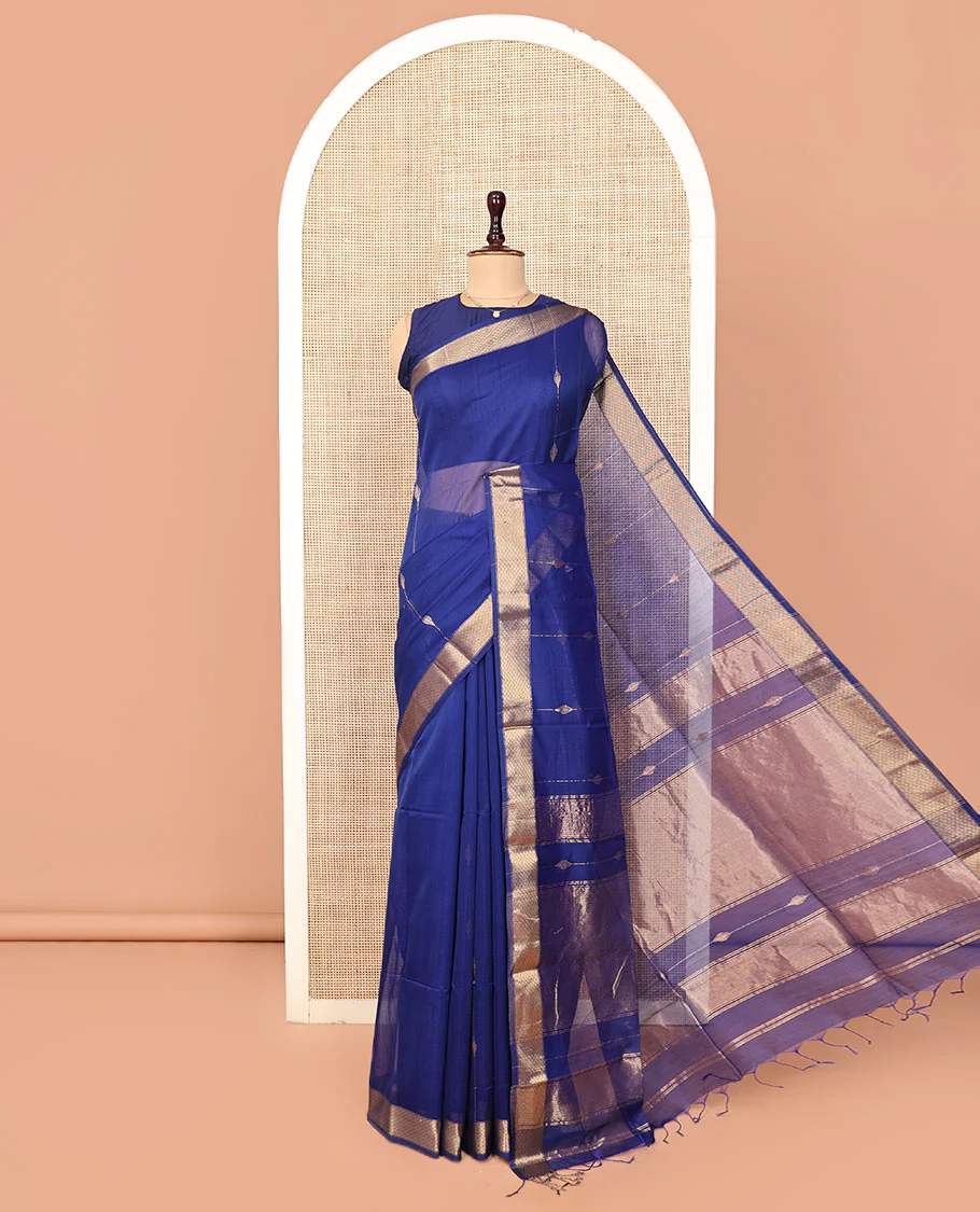 Blue Maheshwari Cotton Saree, Enthralled with Zari Stripes All Over Its Body, Highlighted by a Zari Border of Jaal Motifs, Pallu Steeped with Gleaming Zari Designs, and Paired with a Matching  Blouse