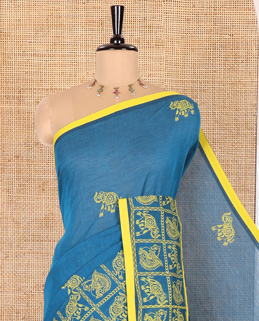 Blue Mangalagiri Cotton Saree Adorned with Elephant Motifs Block Print All Over Its Body, Subtly Printed Border of Animal Butta Enclosed Checks, Pallu Mirrors the Same Border Print, and Paired with a Contrast Printed Blouse - Image 2
