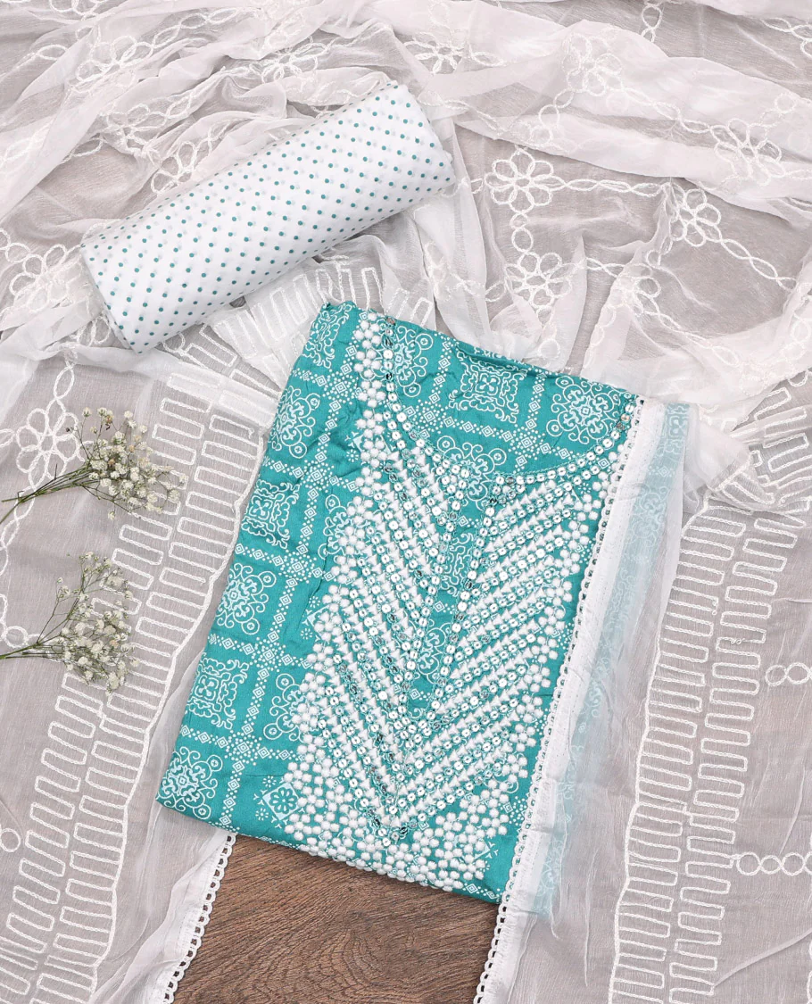 Blue Material Chudidar Set, Elevated with Intricately Printed and Neck Embroidery on Rayon Top, a Contrast Polka Dot Printed Bottom, and Paired with Embroidered Chiffon Dupatta