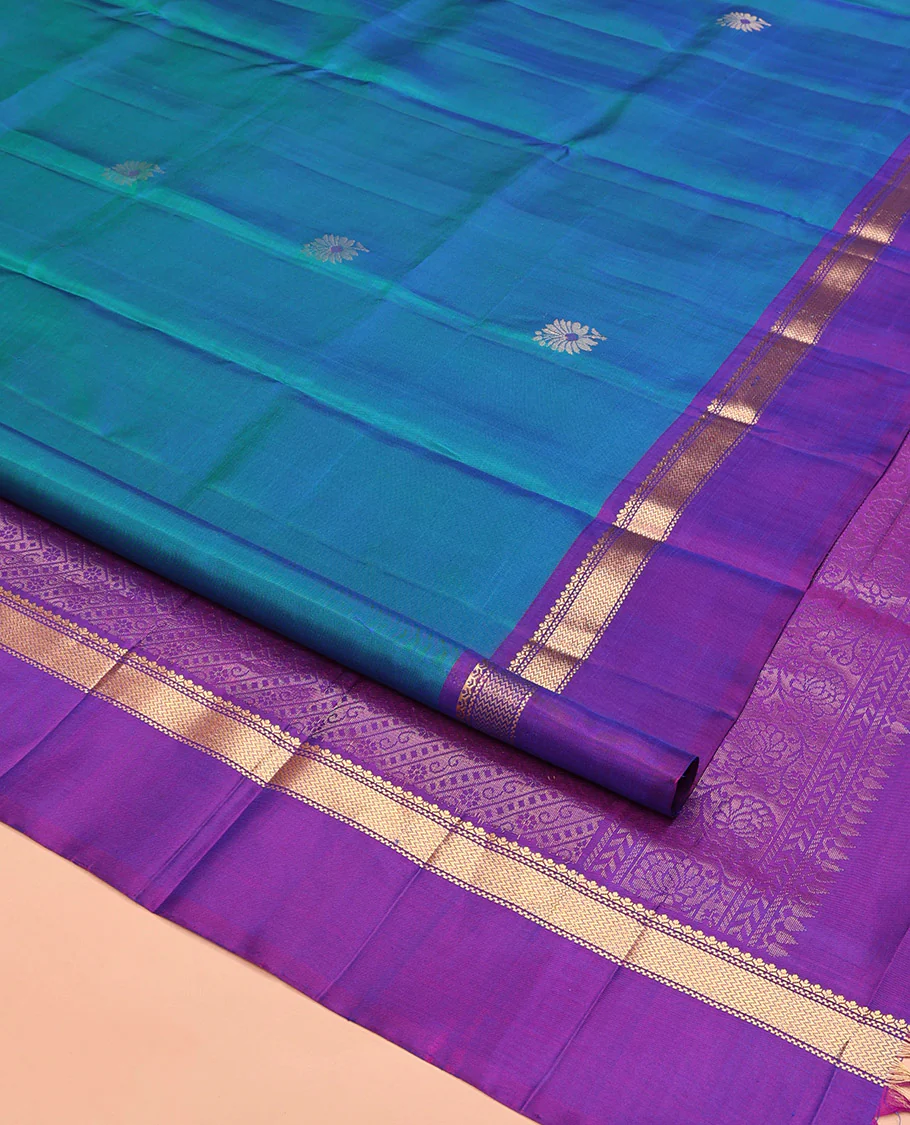 Blue Mayuri Soft Silk Saree Spotlighted with Zari Buttas All Over Its Body, Complemented by Kal Erangina Border of Vanki Designs, Diagonally Woven Pallu and Paired with a Contrast Blouse - Image 2