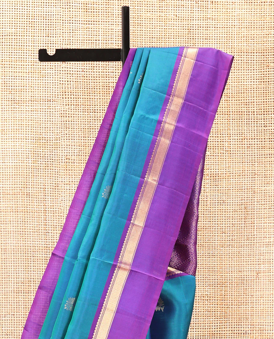 Blue Mayuri Soft Silk Saree Spotlighted with Zari Buttas All Over Its Body, Complemented by Kal Erangina Border of Vanki Designs, Diagonally Woven Pallu and Paired with a Contrast Blouse - Image 3